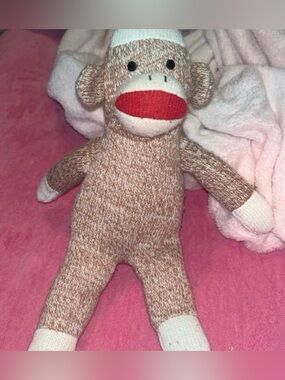 Vintage-Style Brown Sock Monkey Plush with Red Mouth